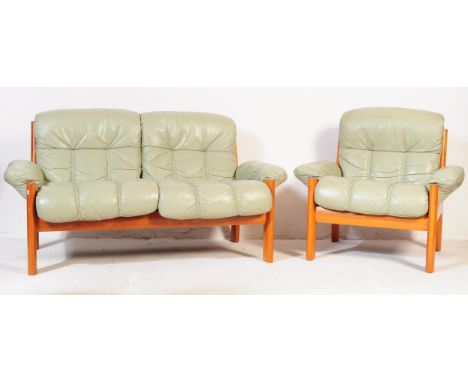 A matching vintage Scandinavian 'Ekornes&nbsp;Montana' two seater sofa / settee and armchair in mint green leather with angul