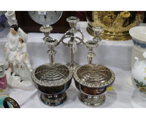 Silver plated candelabra, pair of candlesticks and two rose bowls 