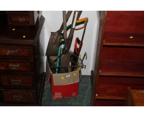 A small collection of garden tools and hand tools 