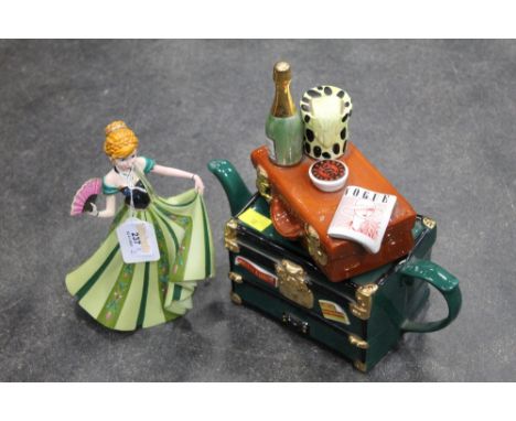 Novelty teapot in the form of suitcase and trunk and a Disney Anna figurine  