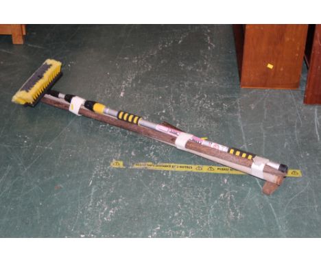 A small bundle of tools and household items 