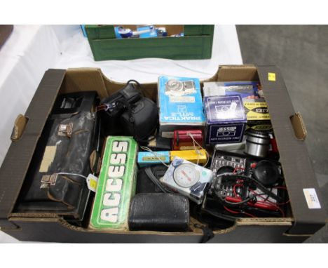 Box of cameras, work light, compass, ammeter etc