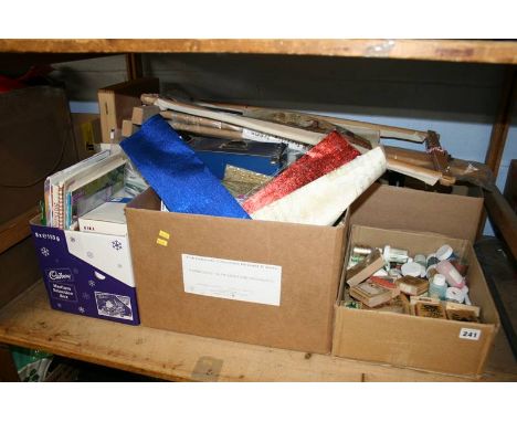 A shelf of artist crafting materials