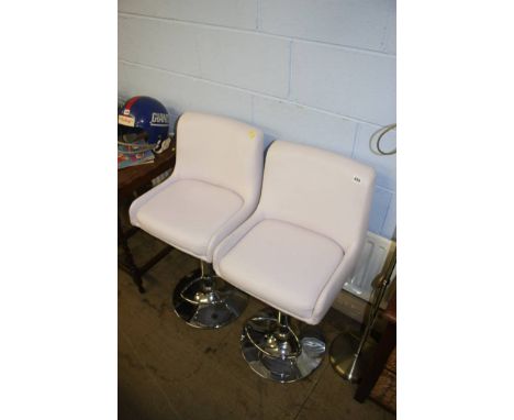 Pair of bar stools and a modern lamp