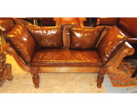 SOFA, early Colonial style teak with scroll back, turned supports and leather cushions, 176cm W. 