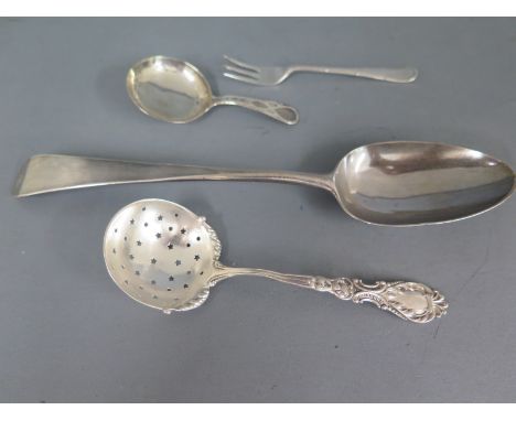 A Georgian silver spoon London 1777, a sifter - repaired, a fork and a caddy spoon - total eight approx 3 troy oz