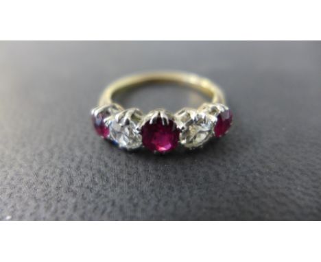 An 18ct gold and platinum ruby and diamond five stone ring - diamonds approx 0.4ct - ring size K - weight approx 3.3 grams - 