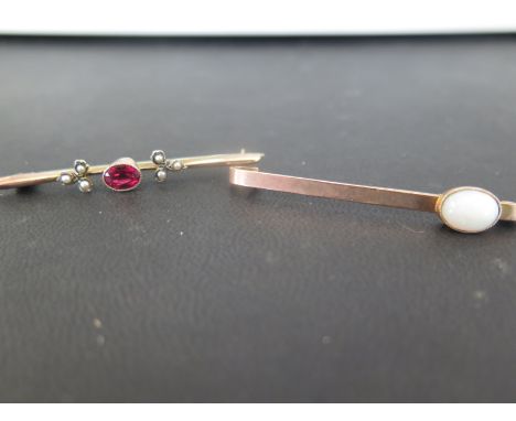 A 9ct gold opal bar brooch - Hallmarked Birmingham - Length 5cms - Together with a red stone and seed pearl brooch - Tests as