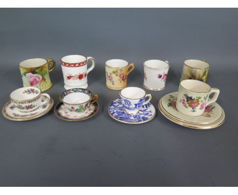 Three miniature Worcester mugs, three miniature cups and saucers, a miniature trio and two other miniature mugs