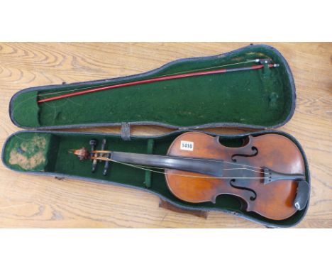 A violin with a one piece 14 1/4inch 36cm back and double purfling hand written label Antonius Stradivarius label dated 1721 