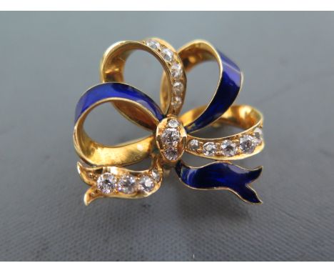 A very good Tiffany & Co early 20th century gold enamel and diamond set ribbon brooch - the reverse stamped Tiffany & Co and 