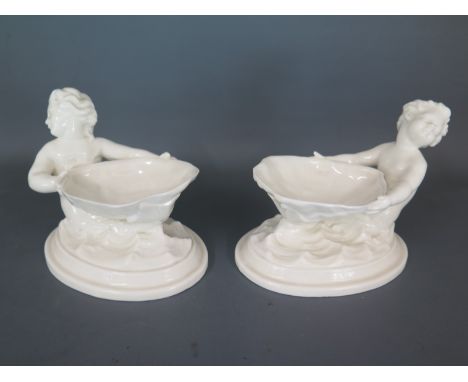 A pair of Royal Worcester Merboy blanc de chine salts no. 349 - both good