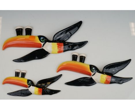 Set of three Guinness Toucan graduating Wall Plaques marked Carltonware, largest 27cms long 