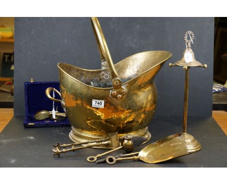 A large brass coal bucket together with a group of fireside tools and a cased set of scales. 