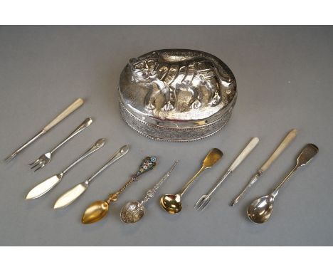 A white metal decorative trinket box with tiger to lid together with a small group of cutllery to include hallmarked silver a