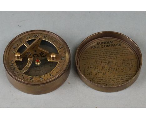 Brass compass and sundial 
