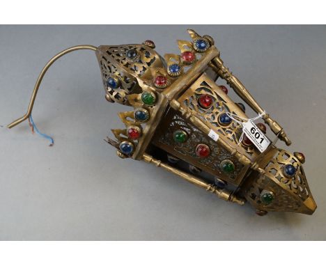 A ornate Moroccan ceiling lamp with jewelled decoration. 