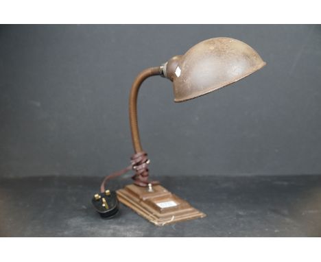 A vintage desk lamp with cast iron base, marked Hawkins &amp; Made In Great Britain. 