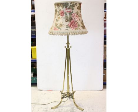 Early 20th century Art Nouveau Brass Telescopic Three Branch Standard Lamp raised on a whiplash base 