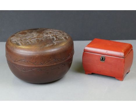 Japanese Circular Hardwood Box, the top carved with a relief Mountain and Temple scene, 19cms diameter together with a Small 