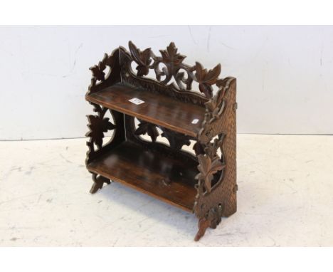 Black Forest small shelf unit, circa 1920s, width approx. 40cm 