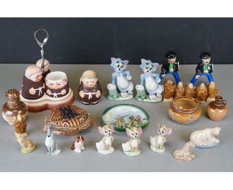 A small collection of ceramic ornaments to include Wade and Carlton ware. 