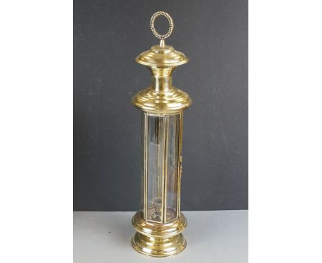 A antique Victorian brass lantern with engraved glass decoration.