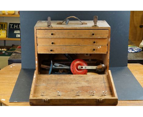 Wooden tool cabinet with carpentry tools 