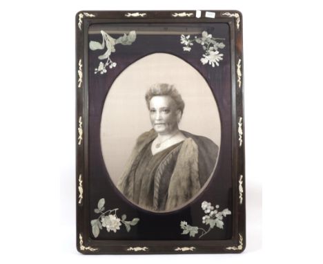 Late 19th/Early 20th Century Chinese Su Embroidery, half seated portrait of a lady worked in monochrome silks, wearing a pend
