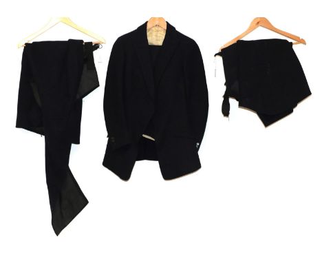 Early 20th Century Lady's Navy Wool Riding Habit, comprising a hunting jacket with one button fastening and a matching apron;
