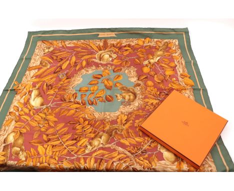 Hermes Silk Scarf  'Casse Noisette' designed by Antoine de Jacquelot with a forest green and caramel striped border, in a Her