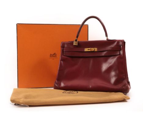 Circa 1979 Hermes Burgundy Kelly Leather Bag, with brass hardware, Hermes impressed to the brass closure fitting, matching re