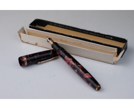 A vintage Parker Duofold fountain pen with 14ct gold nib. 