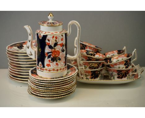 A Coalport Imari pattern part tea set to include coffee pot, cups, saucers and side plates. 