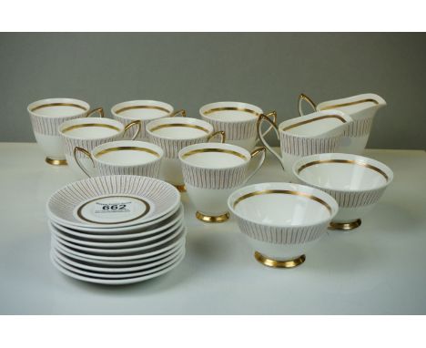 A Royal Albert "Capri" fine bone china tea set to include nine cups (2 x A/F), nine saucers, two milk jugs and two sugar bowl