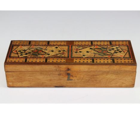 Early 20th century Wooden Games Box, the hinged lid with a Cribbage Board and decorated with playing cards, opening to two pl