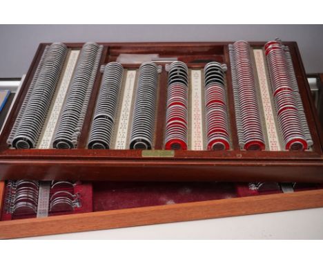 Two vintage set of opticians lenses contained within original boxes. 