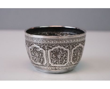A vintage Indian silver bowl with markings to base. 