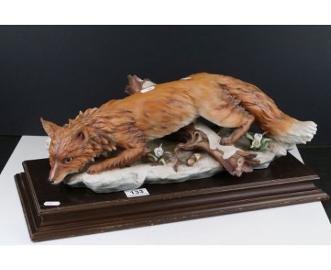 Capodimonte Viertasca Model of a Fox, limited edition no. 707/1000 with coa, 47cms long, on wooden plinth 