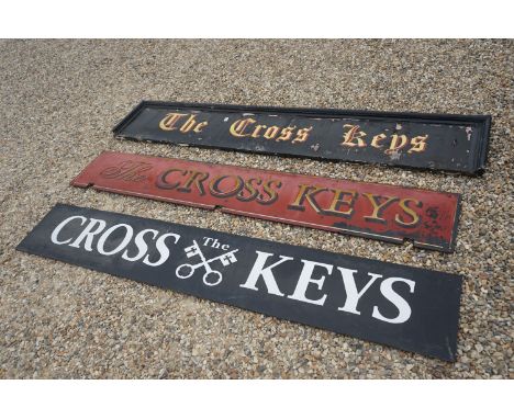 A collection of three vintage pub signs for the Cross Keys in Corsham 