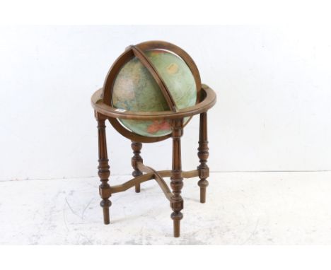 Vintage Philips' Challenge Globes, Paris, Cartes Taride terrestrial globe placed on octagonal wooden pedestals with four legs