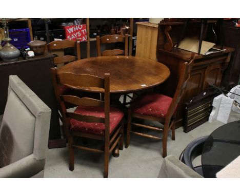 19th century style Oak Oval Tilt Top Dining Table on pedestal support, 114cms long x 74cms high together with set of Four Oak