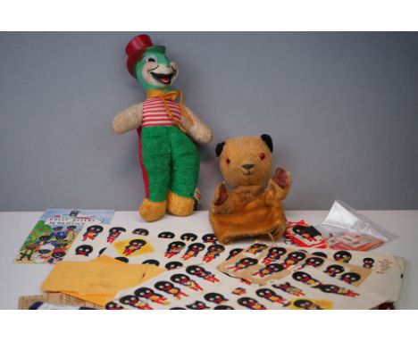 A collection of vintage toys to include a sooty hand puppet, a jimmy Cricket soft toy and a quantity of Robinsons golly colle