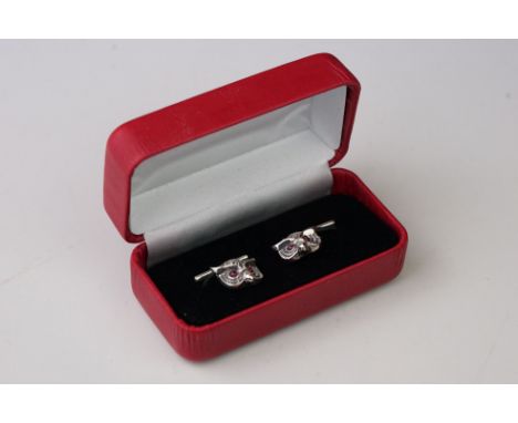 Pair of silver owl cufflinks, with ruby eyes 