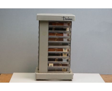 A vintage Darlena rotating watch strap point of sale display stand complete with watch straps. 