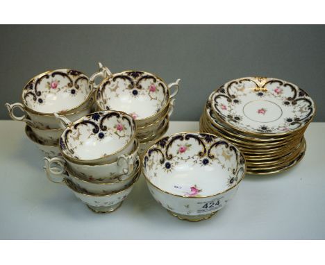 Early 20th century Coalport Part Tea Service decorated in colbalt blue and gilt with pink roses comprising Twelve Cups and Sa