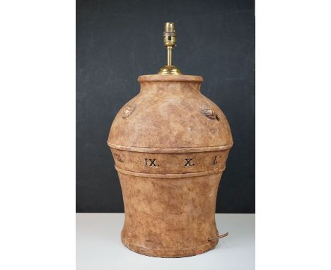 A large Terracotta contemporary lamp with Roman numerals decoration. 