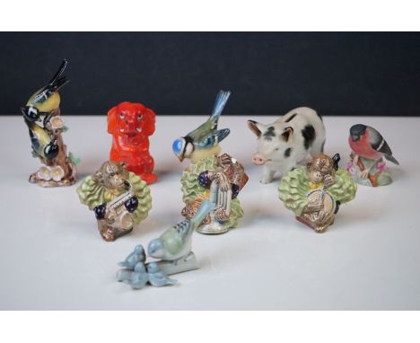 A small collection of ceramic animals and birds to include Goebel. 