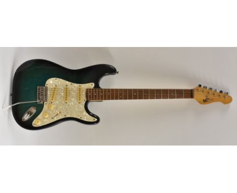 A Vintage, V6 Icon type, electric guitar, in deep green finish, mother-of-pearl effect pickboard, complete with case.