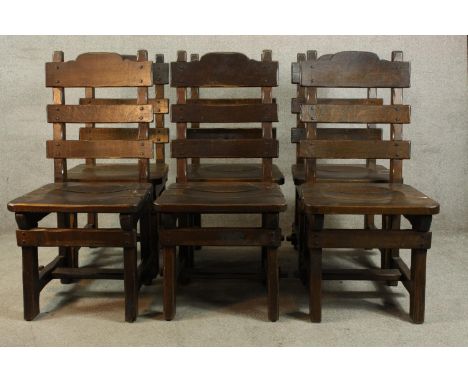 A set of six contemporary oak Gothic style ladder back dining chairs. 